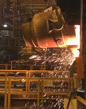 Photograph of pouring of liquid steel from a ladle. Photograph taken by Serg Chanouian at Swerim AB,