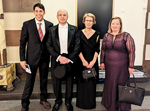 Munir with his wife Jinan and their son with his girlfriend at the doctoral promotion.