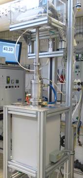 Photograph of the thermogravimetric furnace, which is capable of time-resolved mass change studies under controlled atmospheres and thermal profiles.